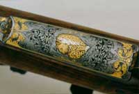 Extensive engraving with much inlay work.